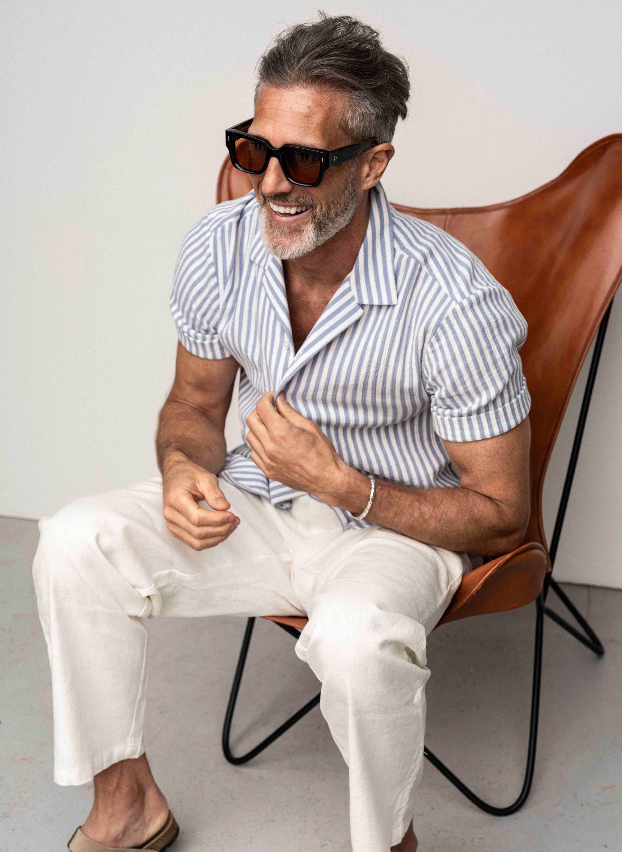 Light blue striped short-sleeved shirt with resort collar