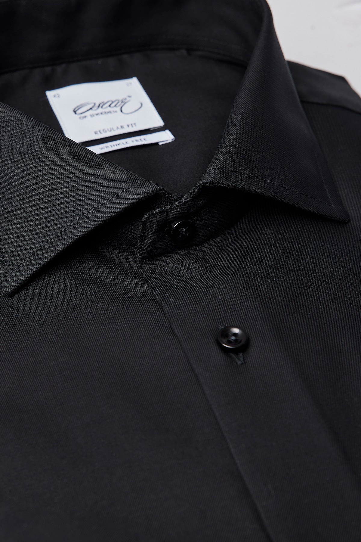 Black shirt with extra long sleeves regular fit